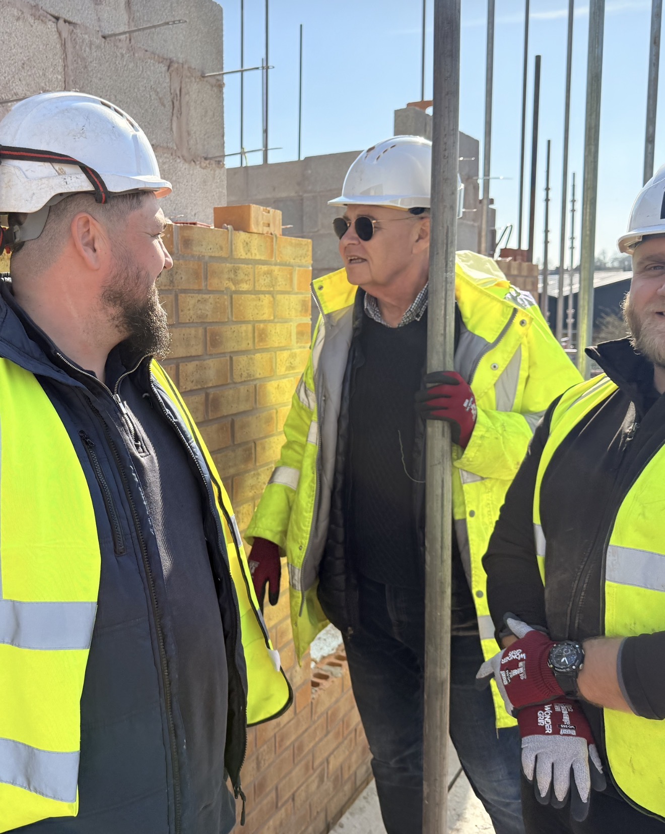 Ian Hodgkinson leading a large construction team